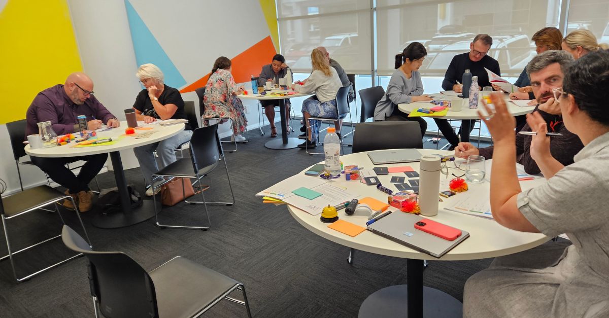 My Food Bag leaders collaborating during the "Raising the Bar" program — building self-awareness, resilience, and leadership impact with Mather Consulting.
